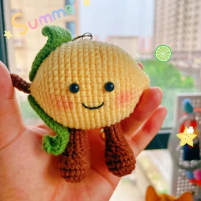 crochet lemon on hand