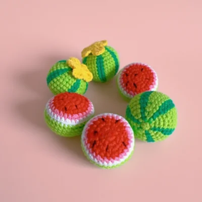 crochet watermelon set pink background